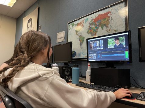 A student edits with Adobe Premiere Pro at the 2022 WJEA J-Camp.