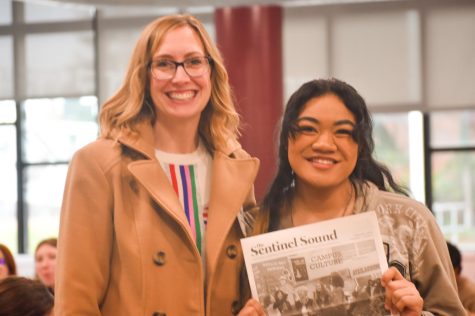 Adviser Lindsay Webster and Editor in Chief Kareiana Taumaletia hold the  newly revived issue of the Sentinal Sound at the WJEA State Convnetion March 4 at Mountlake Terrace HIgh School.